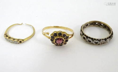 3 various gold and silver rings