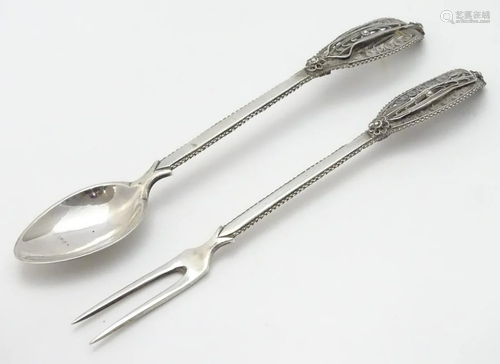 A Continental white metal fork and spoon with fil…