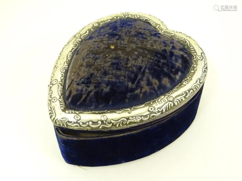 A large velvet covered dressing table box of heart