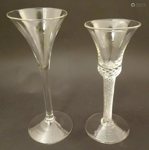 Two 18thC toasting glasses, one with air twist st…