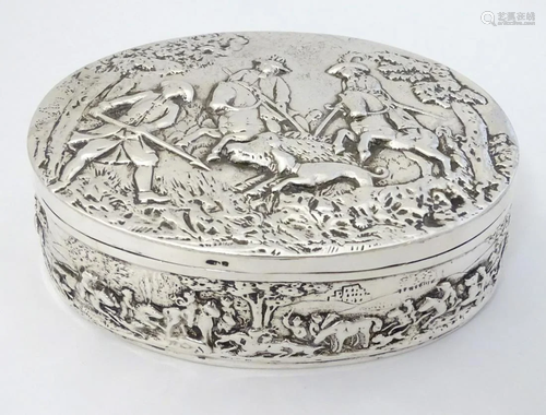 Continental silver table box of oval form profusely