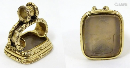 A 19thC yellow metal pendant fob seal with engrav…