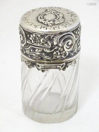 A cut glass jar / scent / perfume bottle with