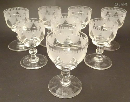 Eight 19thC pedestal glasses with etched decoratio…