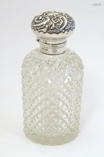 A hobnail cut glass scent / perfume bottle with si…