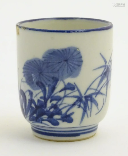 A Japanese blue and white pot with hand painted …