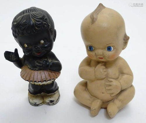 Toys: A painted bisque Kewpie style baby doll, seated