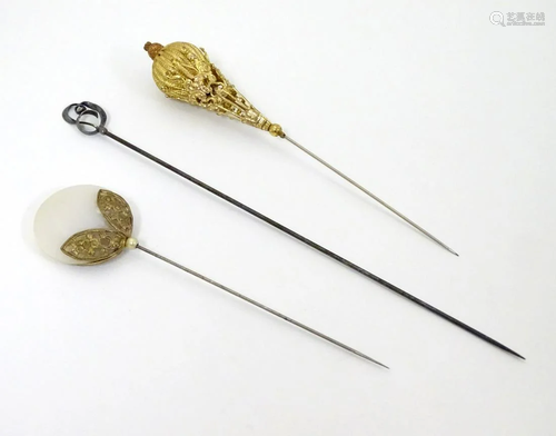 Three decorative hat pins, one Sterling silver (3)