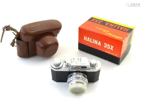 A mid 20thC Halina 35X 101 35mm film camera, with