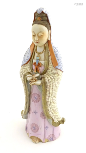 A Chinese famille rose standing figure of Guanyin, t…