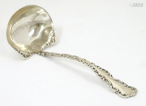 An American Sterling silver sauce ladle 5 1/2'' long