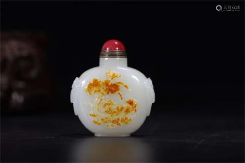 A Chinese Snuff Bottle Made of Hetian Jade Carved with Mandarin Ducks and Lotus