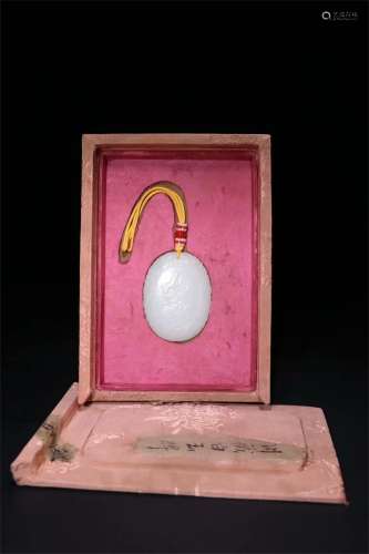 A White Jade Pendant Carved with the Pattern of The lotus And The Swallow