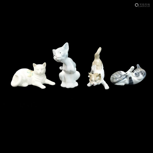 Four Playful Porcelain Cat Figurines