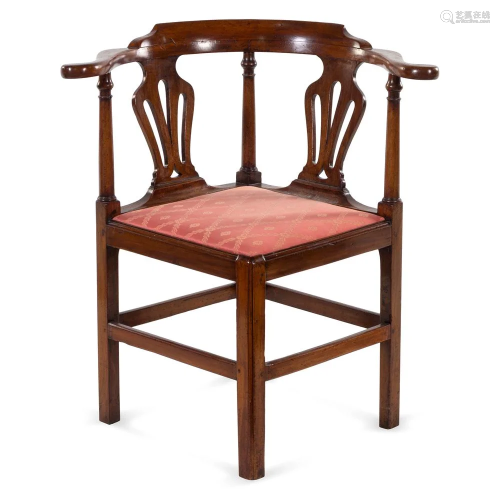 A Chippendale Carved Mahogany Roundabout Corner…