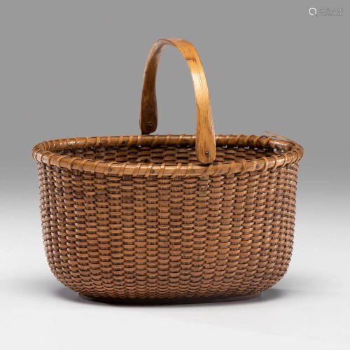 An Oval Nantucket Lightship Basket by A.D. Willi…