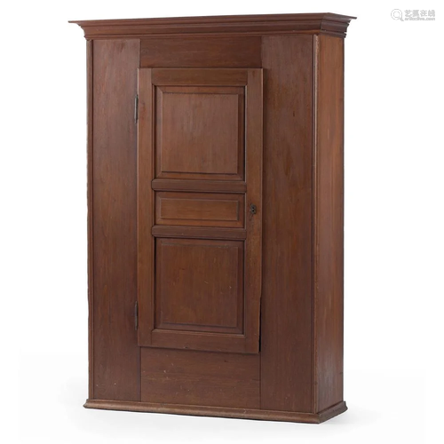 A Molded and Paneled Walnut Cupboard