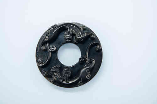 A Chinse Black Jade Double Dragon Carved Coin