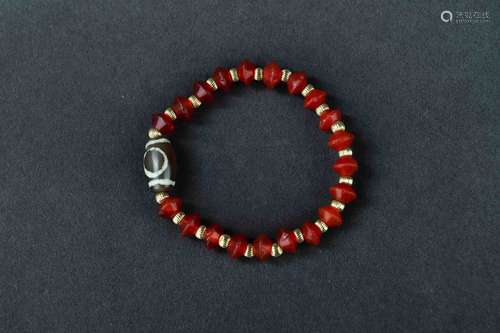 A Chiense Red Agate Hand String