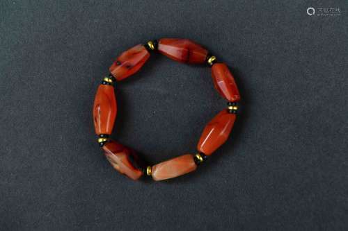 A Chiense Red Agate Hand String with 24K Gold Septa