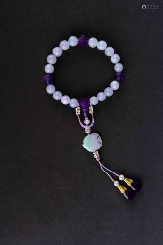 A Chinese Violet Jadeite Hand String