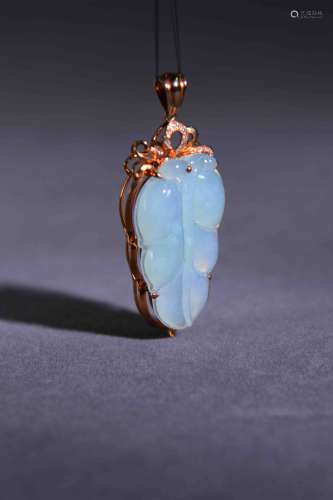 A Chinese Jadeite Pendant with Rose Gold Inlaid
