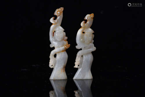 A Pair of Chinese Jade Figurines.