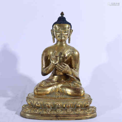 A Chinese Gilt Bronze Statue of Buddha.