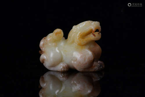 A Chinese Carved Jade Lion.