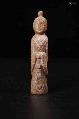 A Chinese Carved Jade Figure.