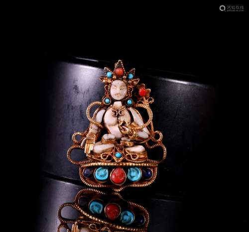 A Chinese Bronze Pendant Inlaid with Gems.