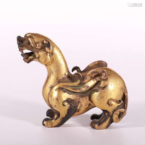 A Chinese Gilt Bronze Beast.