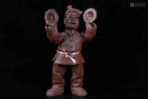 A Chinese Zisha Pottery Figure.