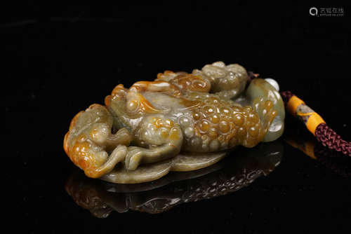 A Chinese Yellow Jadeite Pendant.