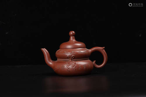 A Chinese Zisha Pottery Teapot.