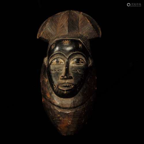 Masque Bois sculpté, patine foncé. République de Côte d'Ivoire, ethnie Baoulé
