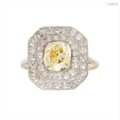 An early 20th century yellow and colourless diamond set cluster ring