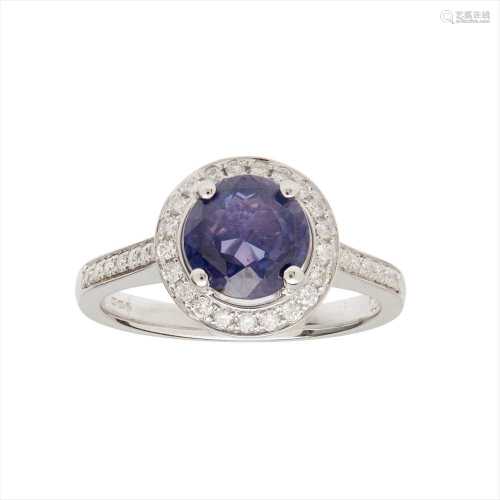 A purple sapphire and diamond set ring