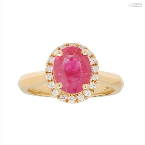An 18ct gold ruby and diamond set cluster ring