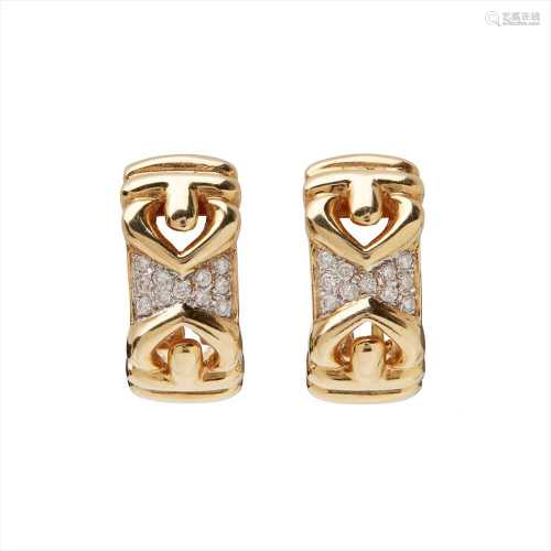 A pair of diamond set earrings