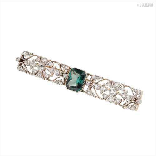 A green spinel and diamond set bar brooch
