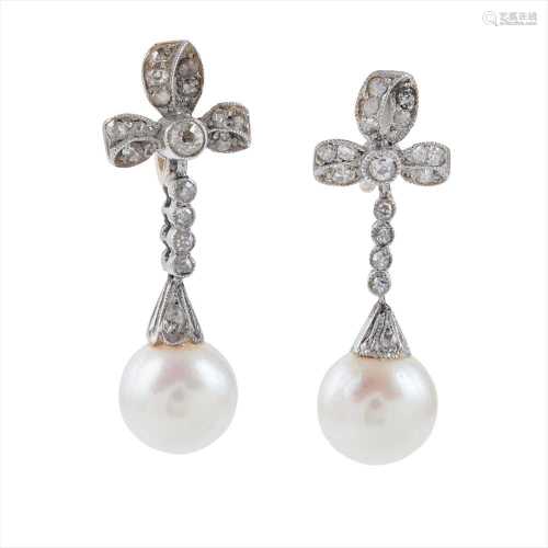 A pair of early 20th century pearl and diamond set pendant earrings