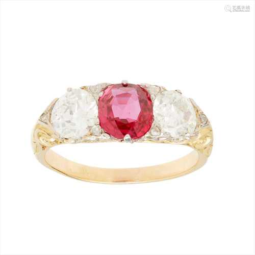A three stone ruby and diamond set ring