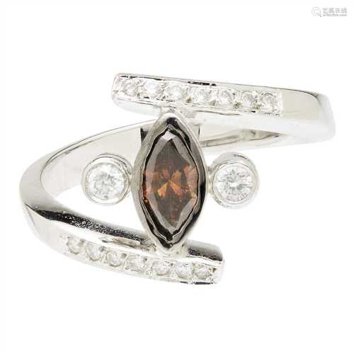 A fancy brown and colourless diamond set ring