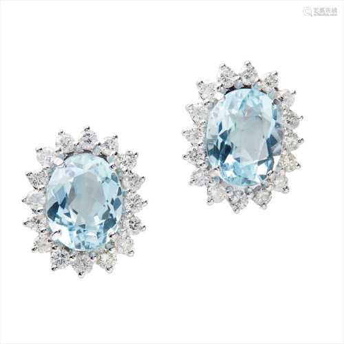 A pair of aquamarine and diamond set cluster earrings