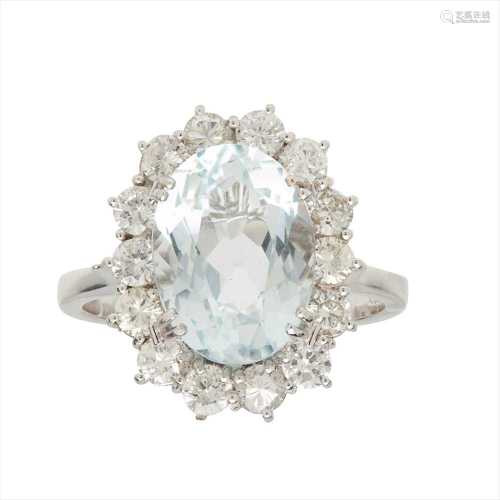 An aquamarine and diamond set cluster ring