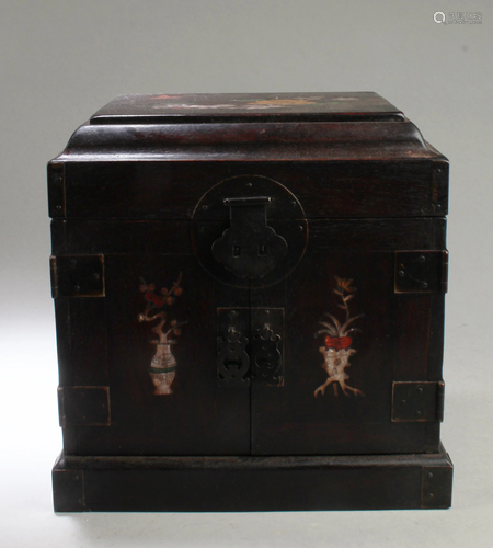 A Hardwood Jewelry Box With Pearl Inlay