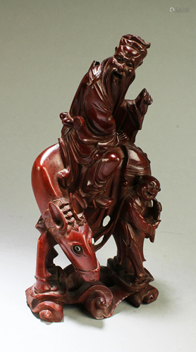 A Carved Wooden Figurine