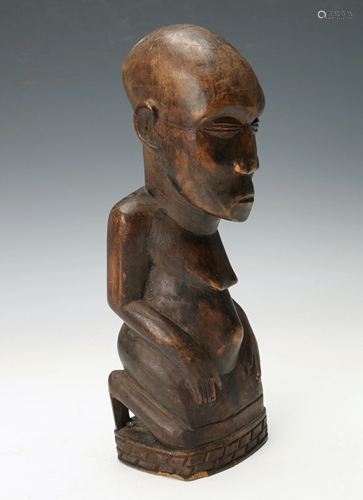 CARVED WOODEN KNEELING FERTILITY FIGURE