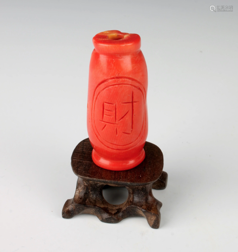 CORAL SNUFF BOTTLE ON STAND